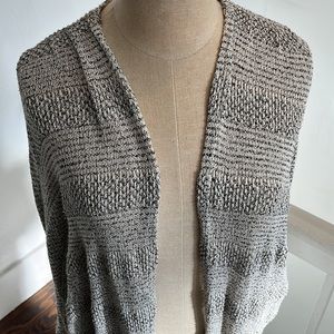 Long, light cardigan sweater made by Lush
